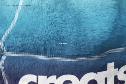 Close-up view of a fleece beanie mockup showing blue gradient colors, visible seams, and soft texture.