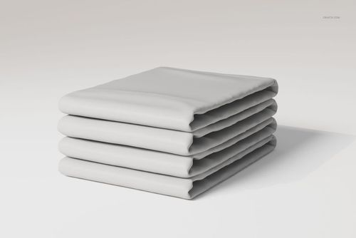 Stack of folded cotton flat sheets in light gray color, shown from a front angle on a plain background.