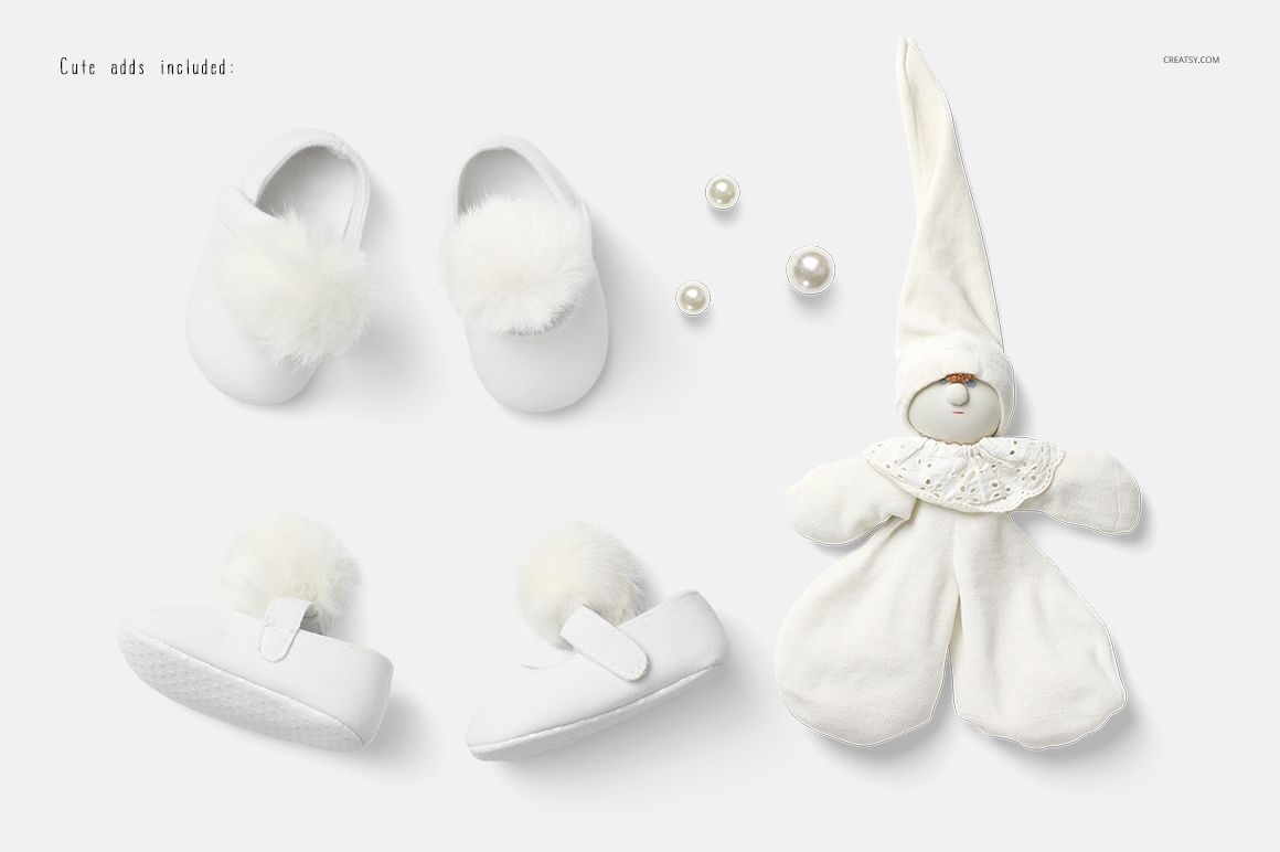 White baby romper mockup set with plush slippers, decorative pearls, and a soft fabric doll on a light background.