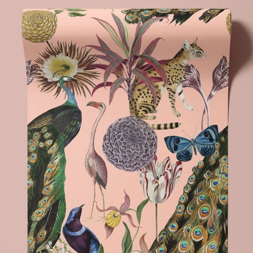 Paper wallpaper mockup featuring a pastel pink background with detailed illustrations of peacocks, a cat, flowers, and a butterfly.