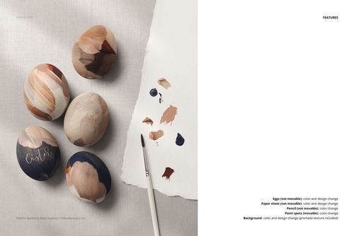 PSD mockup of vintage-inspired Easter eggs with artistic brushstrokes, displayed on fabric with painting supplies, top perspective.