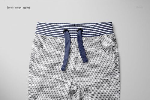 Front view of baby sweatpants mockup with blue striped waistband and drawstrings, featuring a gray camouflage pattern.