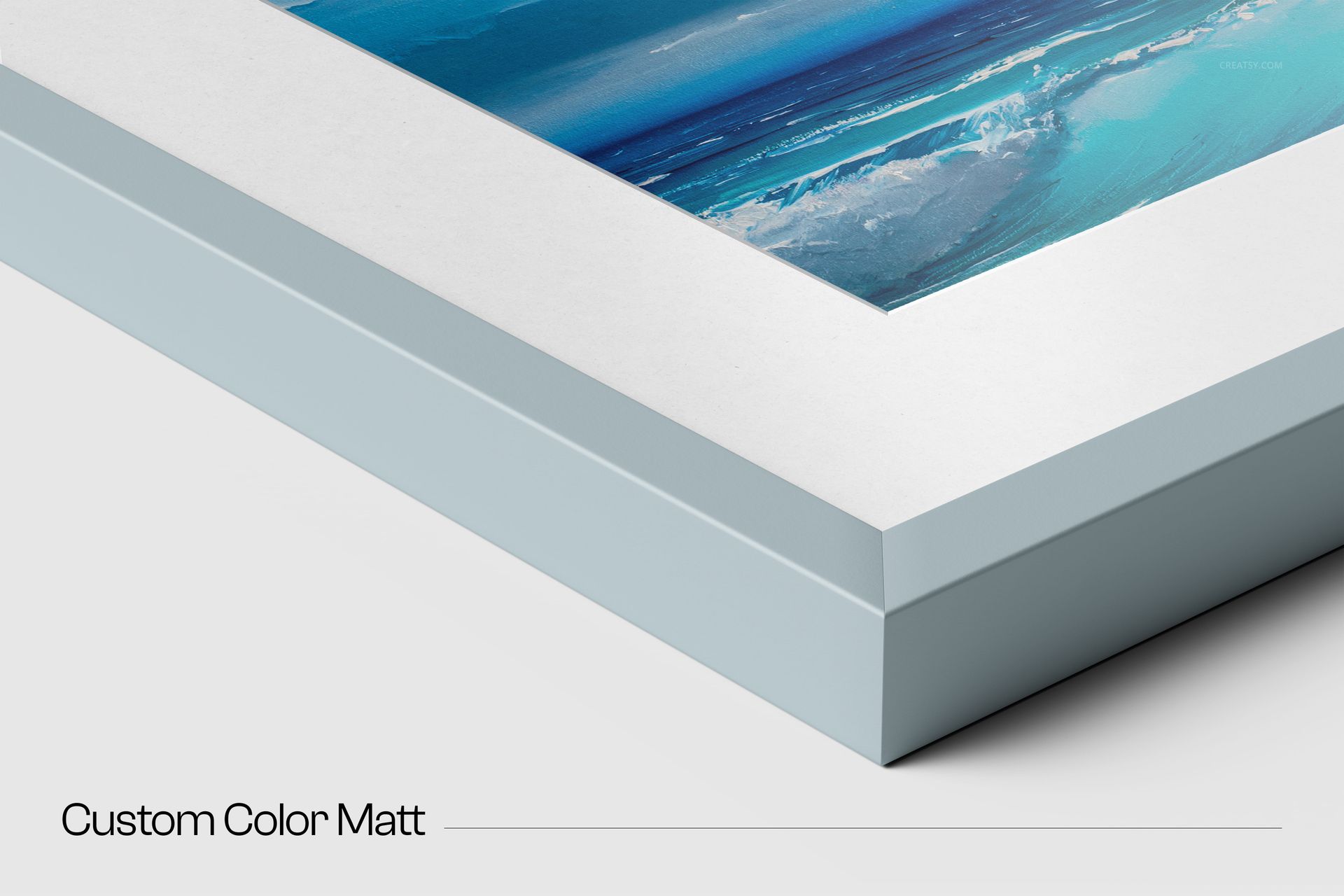 Close-up view of a solid wooden frame mockup featuring a light blue matte border and abstract blue artwork.