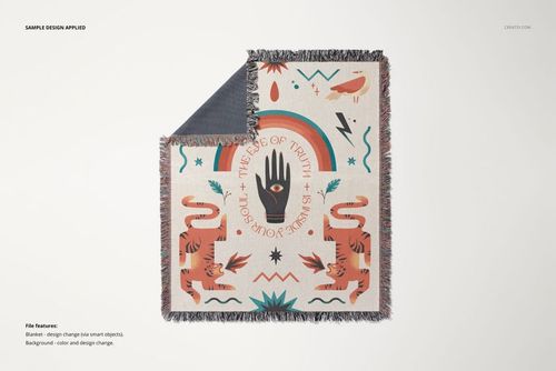 Jacquard fringed blanket mockup featuring hand and tiger illustrations, displayed flat with visible corner fold.