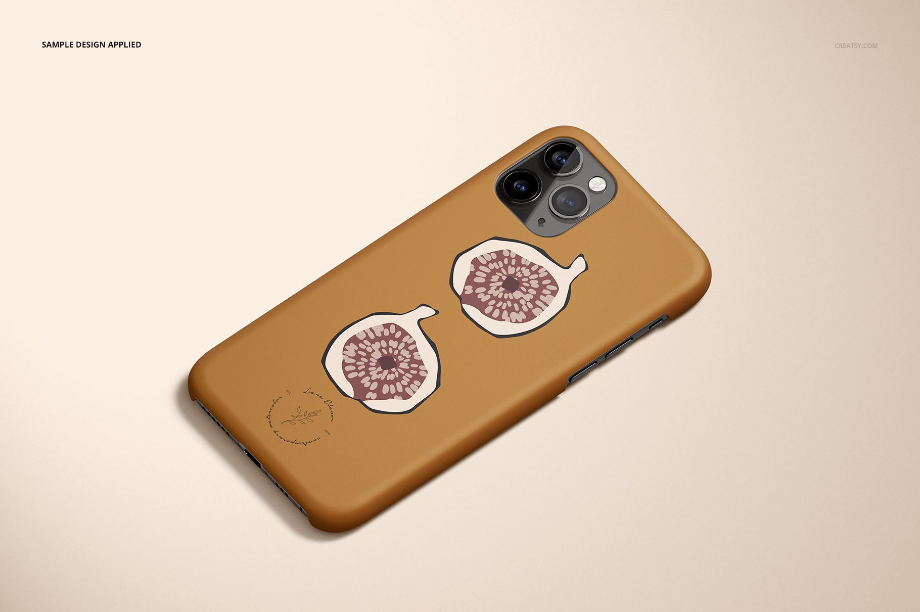iPhone 11 Pro matte snap case mockup with a brown background and illustrated fig design, shown in angled view.