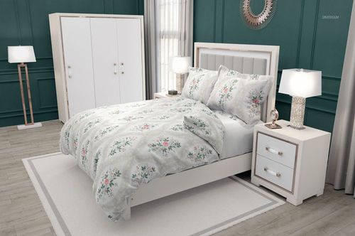 Front view of a bedding mockup with flanged pillows and floral design, displayed in a stylish bedroom interior.