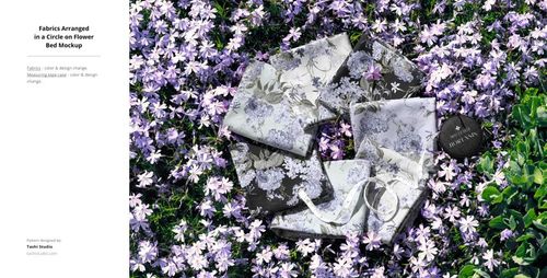 PSD mockup showing multiple fabric swatches with floral designs arranged on a lush bed of purple flowers outdoors.
