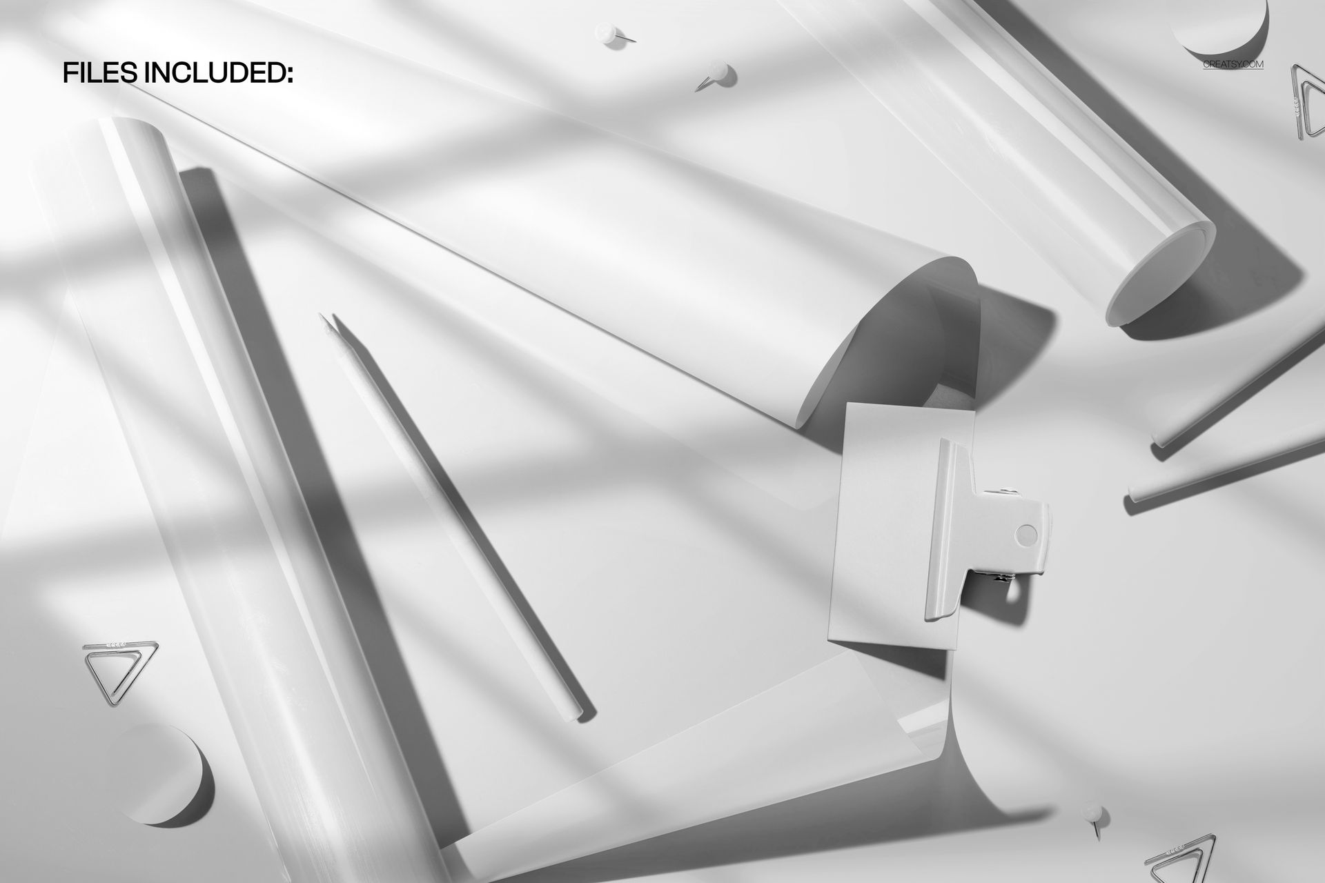 PSD mockup featuring rolled and flat poster sheets, a pencil, and various stationery items in a well-lit scene.