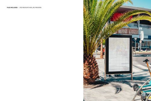 Outdoor city street poster mockup featuring a blank vertical display near a palm tree and modern buildings in sunlight.