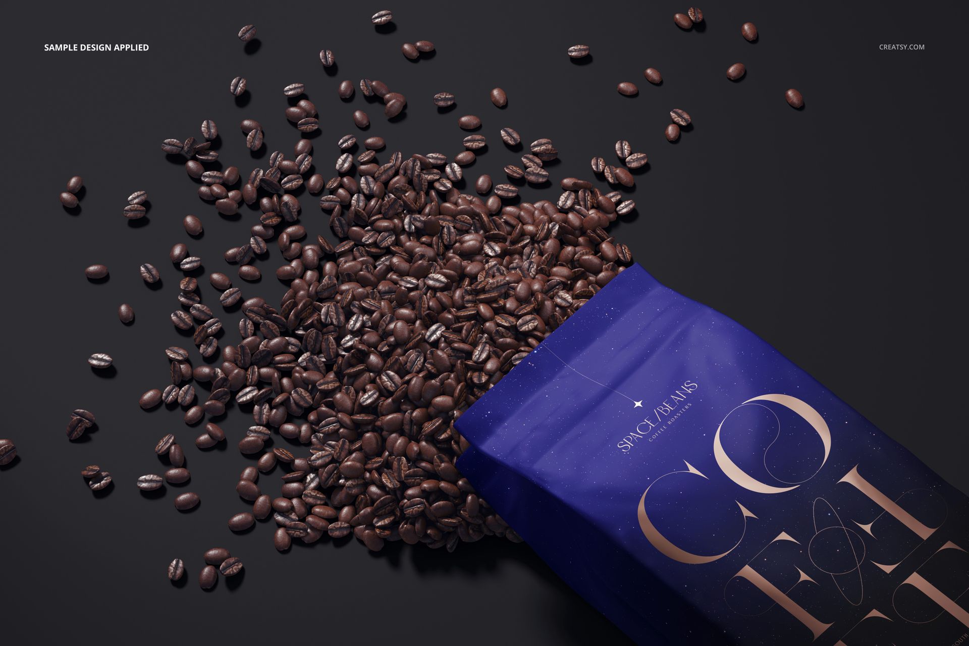 Matte coffee bag mockup with dark blue packaging, shown from a top angle with coffee beans spilling out.
