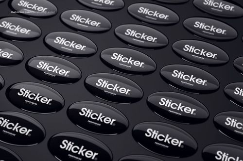 Angled perspective of several shiny oval stickers with bold white text, featured in a PSD mockup layout.