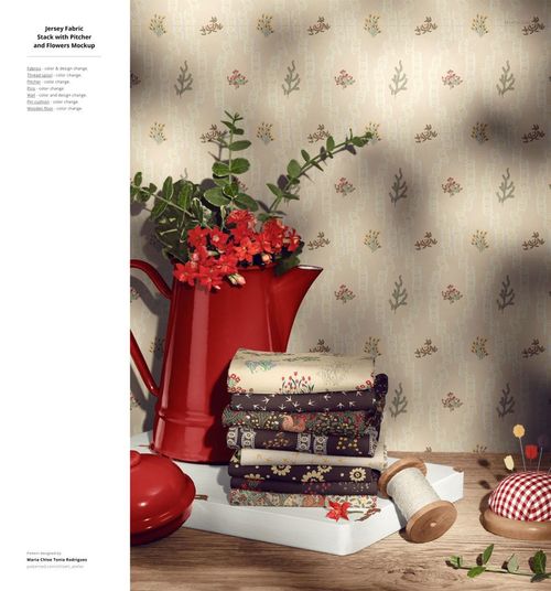 Front view of patterned jersey fabric mockup bundle, with stacked textiles, red jug, flowers, and sewing accessories.