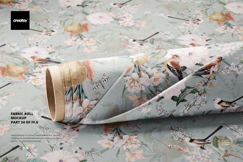 Fabric roll mockup featuring a soft blue base with flowers, birds, and butterflies, displayed in a realistic front view.