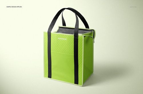 Insulated cooler bag mockup in bright green with black handles, shown in a three-quarter front view on a light background.