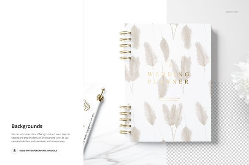 Spiral planner mockup featuring soft beige leaf motifs and gold lettering, shown on a white and marble background.