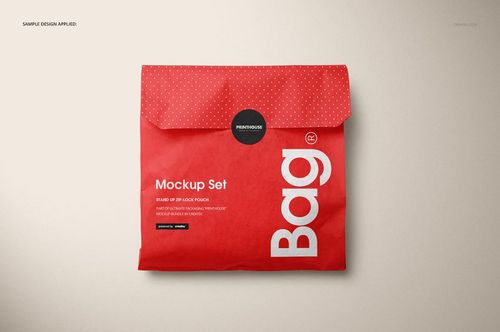 Red snack paper bag mockup with white graphic elements and polka dot flap, displayed against a light surface.