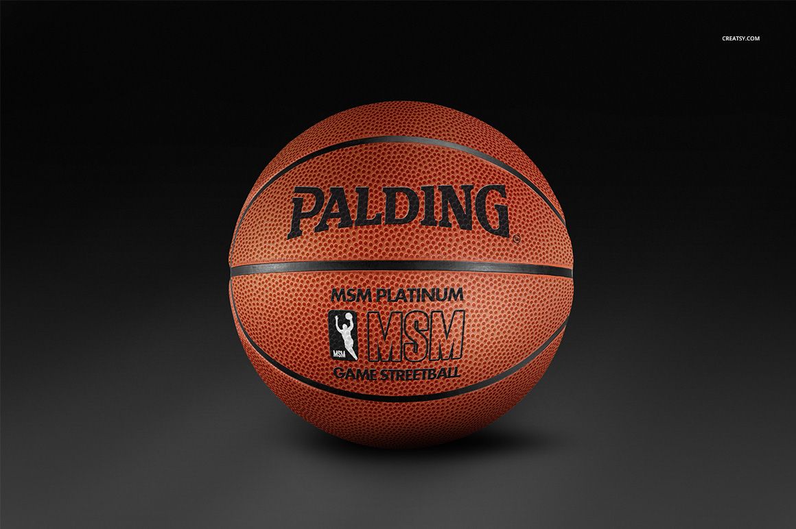 Basketball ball mockup showing detailed pebble texture and bold black branding, centered against a neutral backdrop.