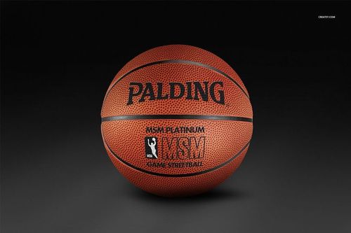 Basketball ball mockup showing detailed pebble texture and bold black branding, centered against a neutral backdrop.