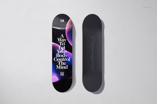 Skateboard deck mockup set featuring one deck with a glossy resin finish and vibrant abstract art, and one with a matte black back, both laid flat on a neutral surface.