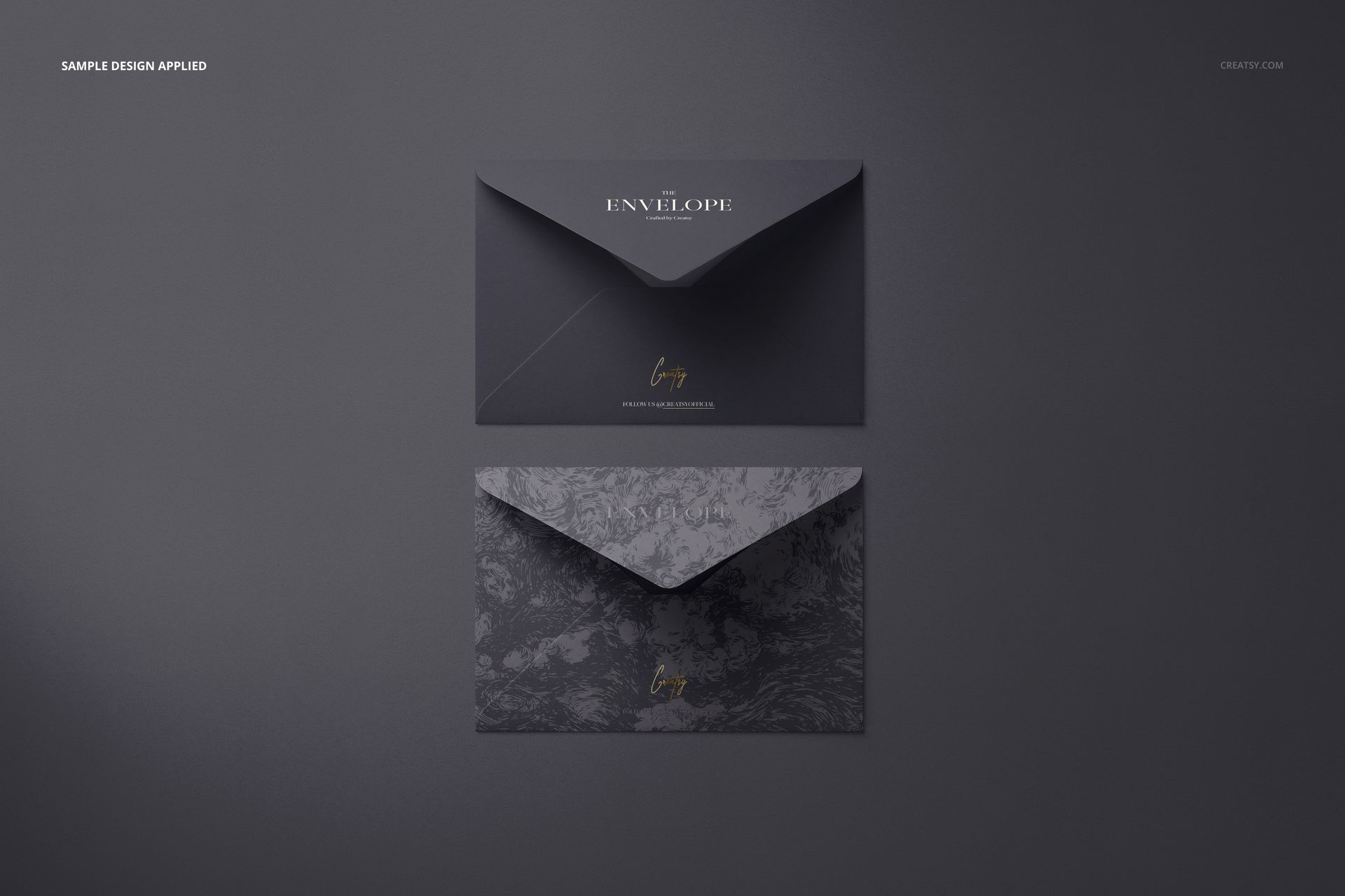 Small envelope PSD mockup set featuring two envelopes in dark tones, one solid and one with a decorative pattern.