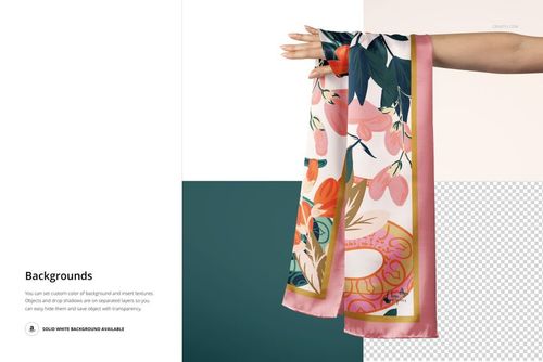 Silk scarf mockup showing vivid pink, green, and cream patterns, elegantly hanging from a hand over a modern background.