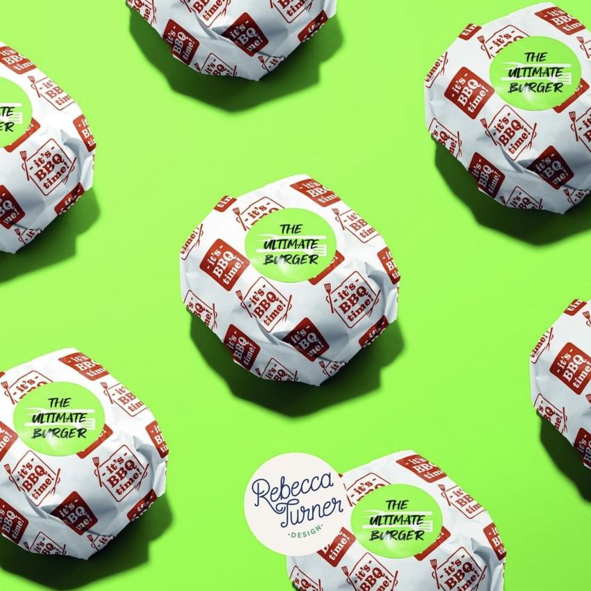 Burger packaging mockup featuring wrapped burgers with patterned food safe paper on a bright green background, viewed from above.
