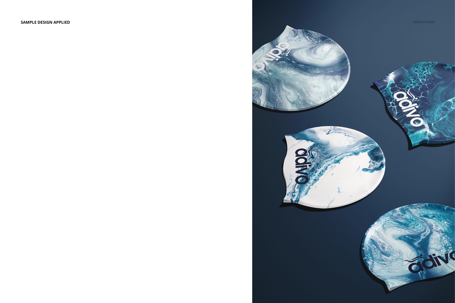 PSD mockup of swim caps with swirling blue and white patterns, positioned on a navy surface from above.
