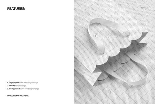 Scalloped gift paper bag mockup shown from a top view, featuring white handles and a grid background.