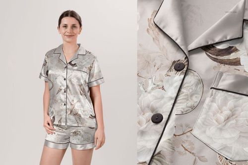Adult silk short-sleeve pyjama set mockup featuring a light gray floral pattern, shown from the front view.