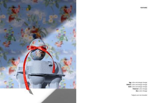 Decorated Easter egg mockup featuring a floral design and red ribbon, placed on a gray carton with floral wallpaper.