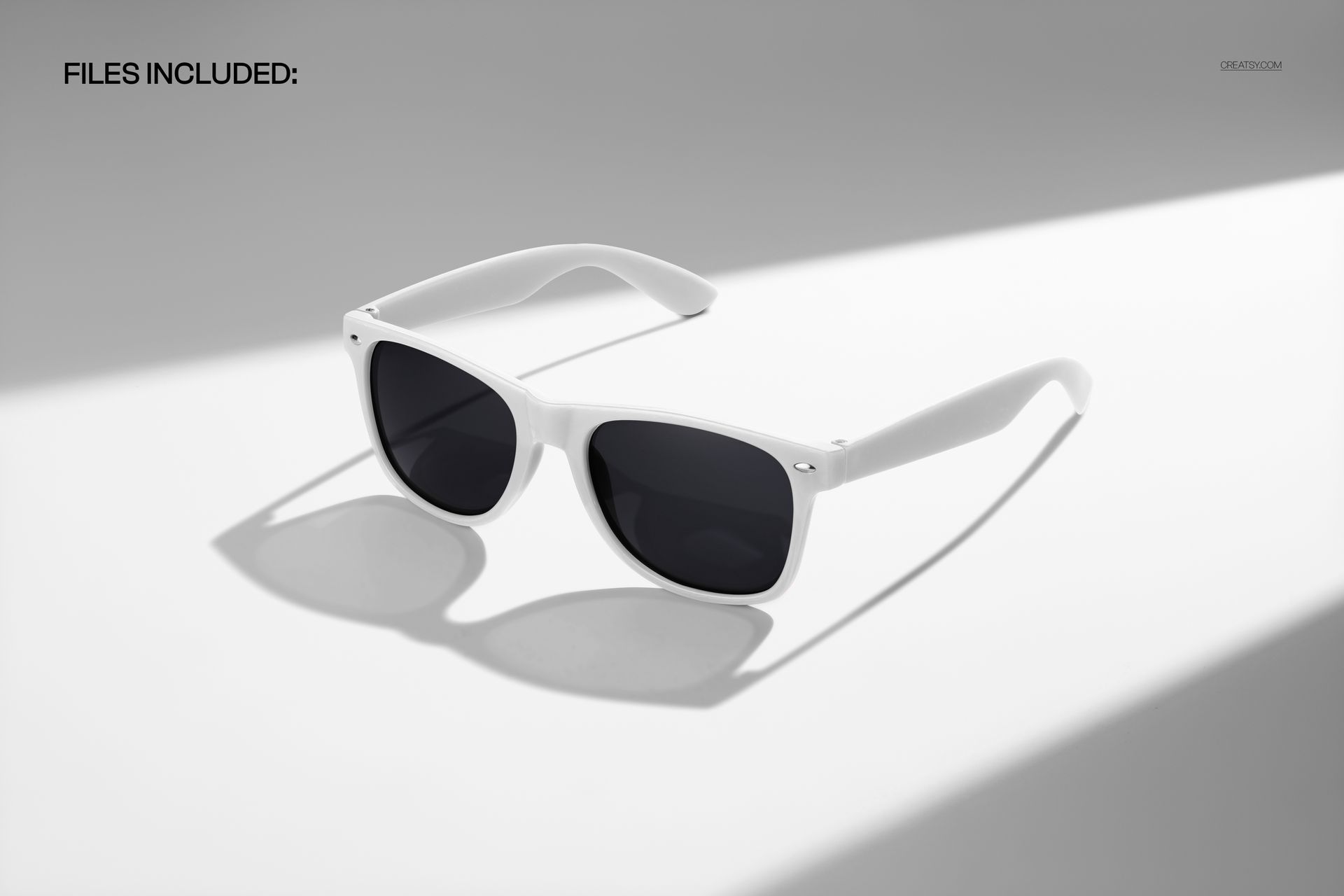 White sunglasses with dark lenses displayed on a sunlit surface, shown in a front angled view for a mockup scene.