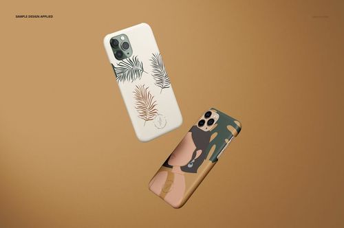 iPhone 11 Pro matte snap case PSD mockup showing two cases with creative artwork, displayed against a plain brown surface.