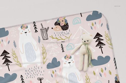 Kids blanket mockup featuring whimsical bear and hedgehog designs, pastel colors, and a soft toy on the side.