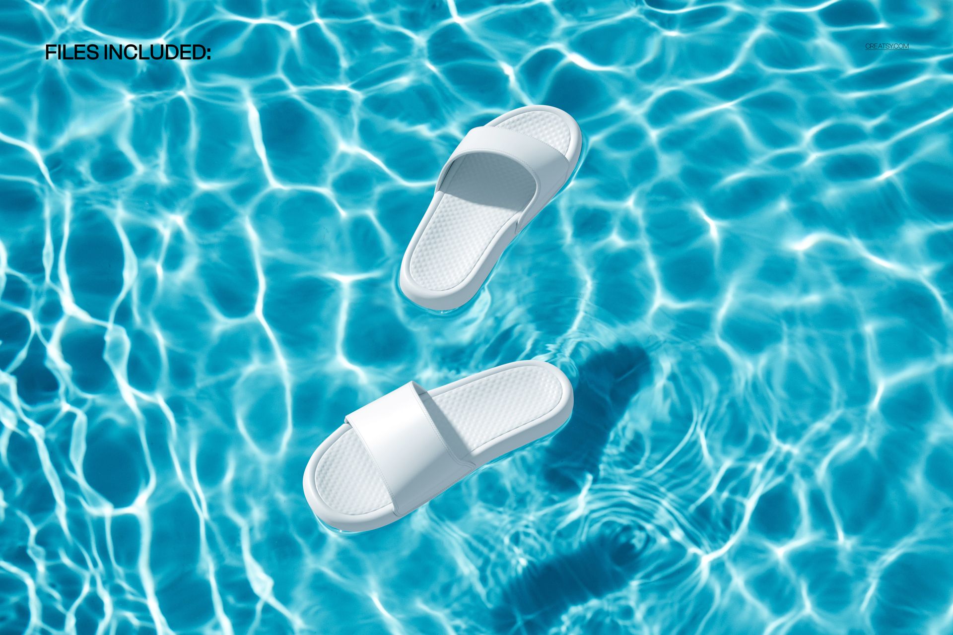 Pair of plain white slide sandals drifting on shimmering blue pool water, seen from above in a PSD mockup.