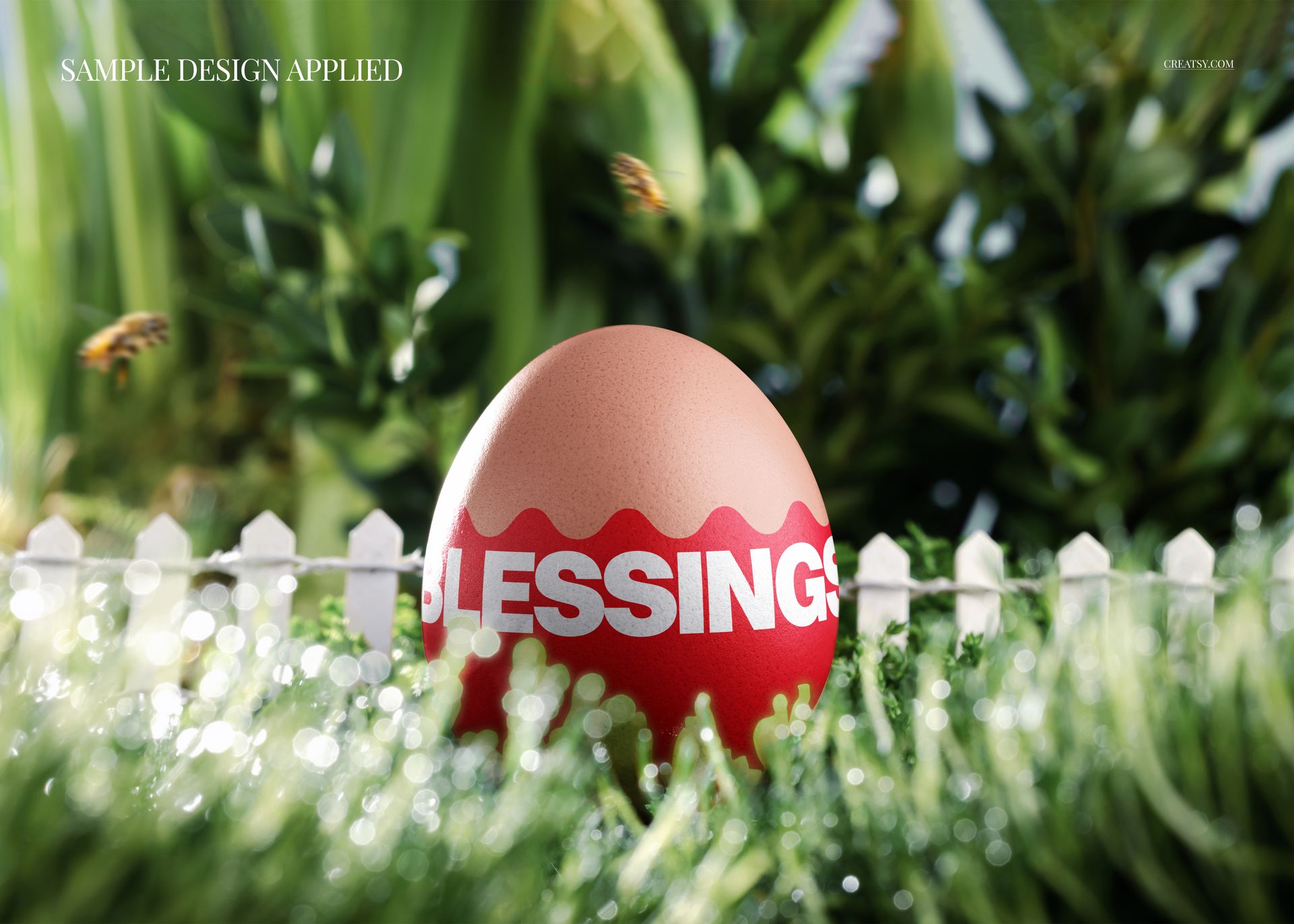 Easter egg mockup with red and white pattern and text, placed in a spring garden with green grass and plants.