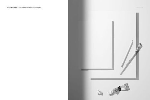 PSD mockup showing two blank paper pads, a pencil, a brush, and paint tubes on a clean, light background from above.