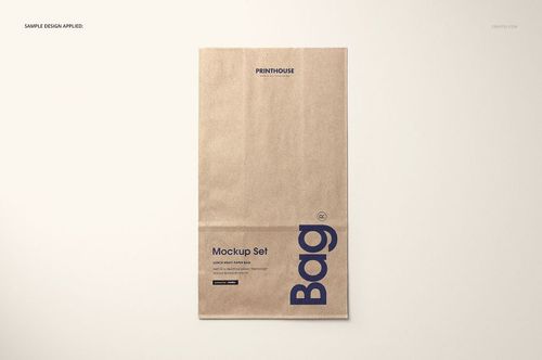 Single kraft paper bag mockup shown from above, featuring bold blue lettering and minimalist design.