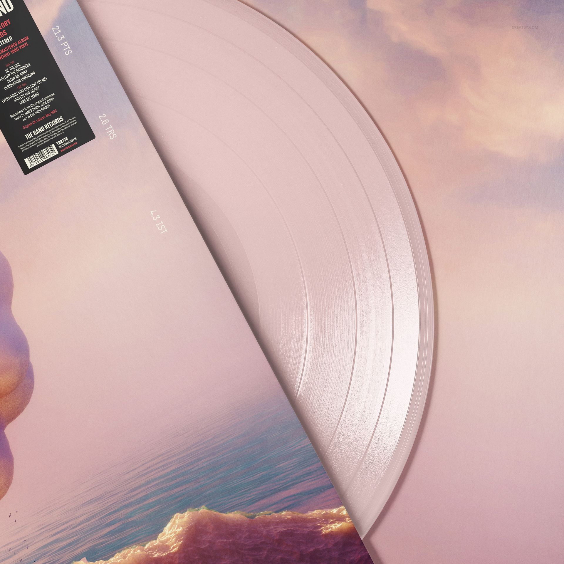 Front angle of a colored vinyl record mockup set showing a pink disc and album cover with dreamy ocean imagery.