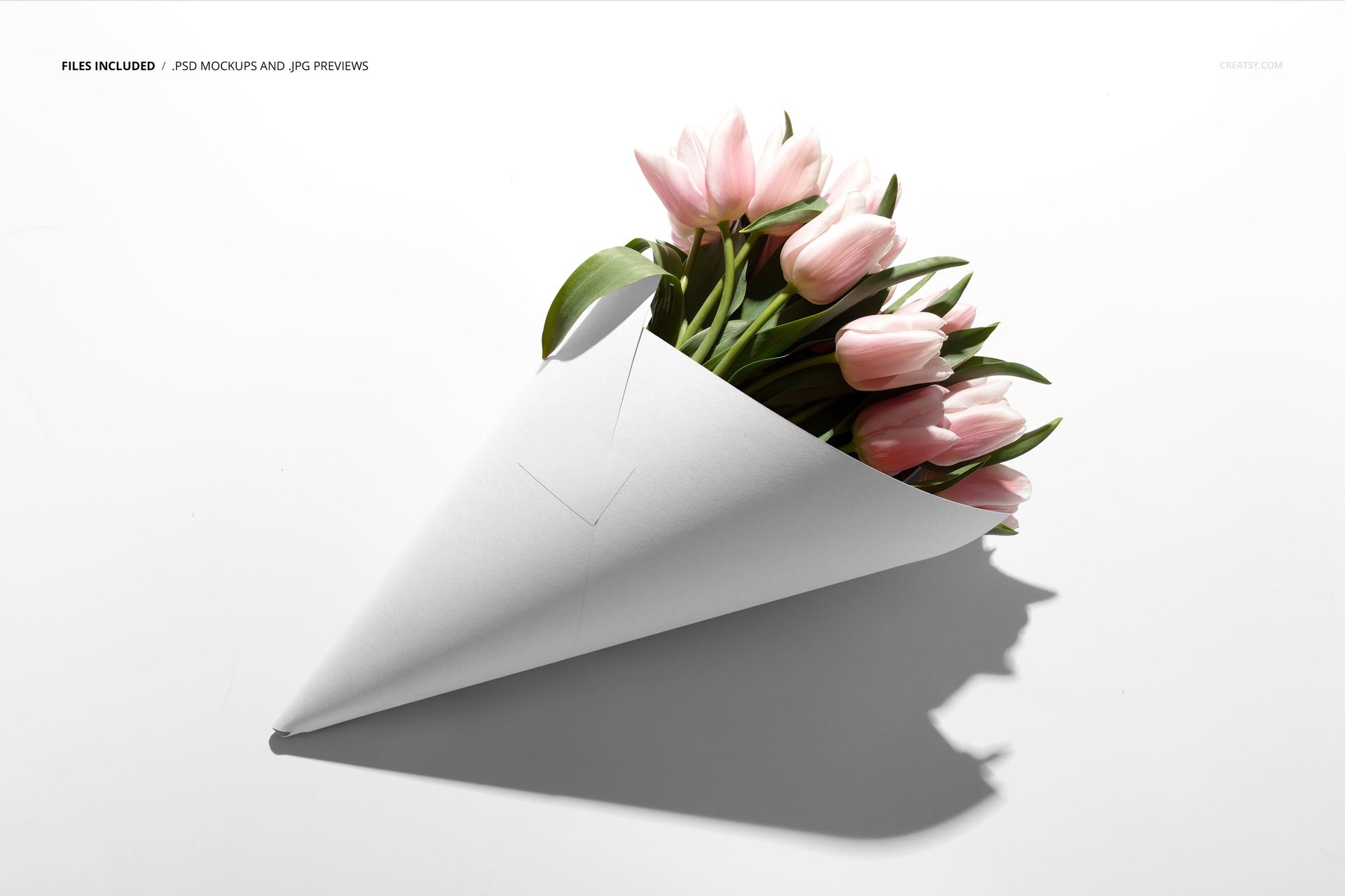 Pink tulip flowers arranged in a white cone-shaped wrapper, shown in a clean and minimalistic mockup scene.