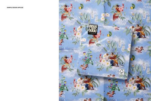 PSD mockup of napkins featuring a blue background with flowers and cherubs, shown in a top-down arrangement.