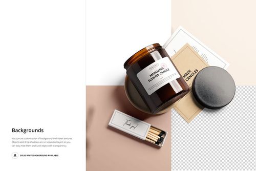 Mockup set featuring an amber jar candle, matchbox, lid, and stationery items on a split-color background, overhead perspective.