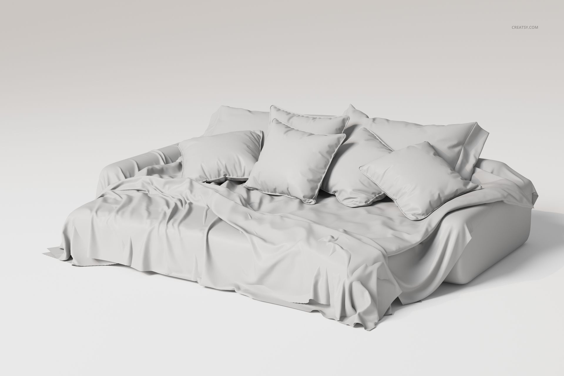 Luxury bedding set with multiple pillows and draped blanket in light gray, shown from a front angled perspective.