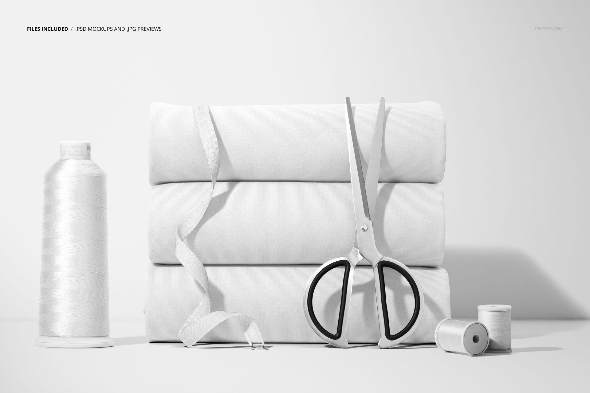 Stack of Folded Jersey Fabrics with Tailoring Tools Mockup - mockup screenshot 2