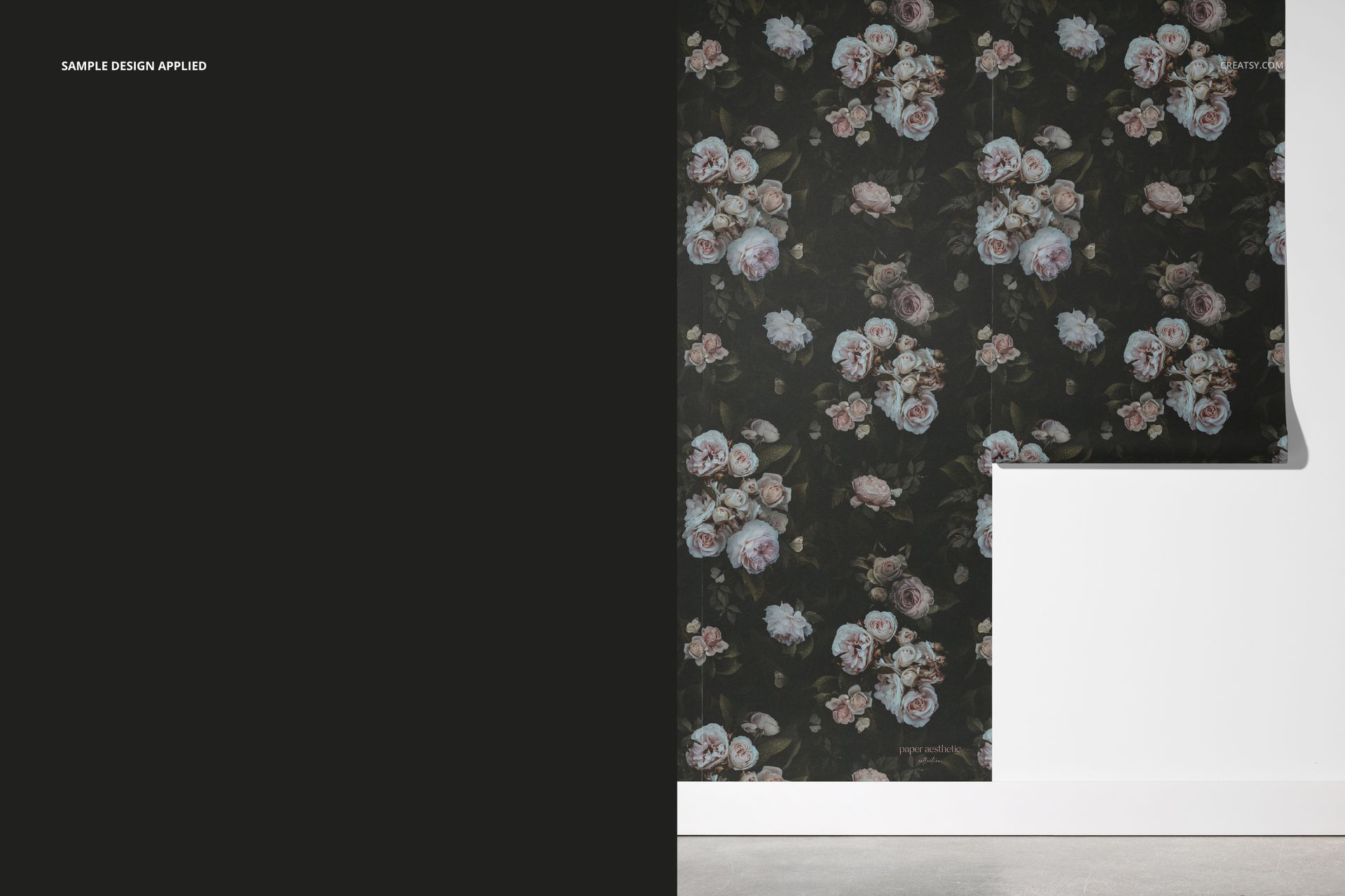 Front view of a non-woven vinyl wallpaper mockup with dark floral pattern, partially applied to a white wall.