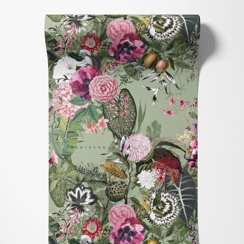 Paper wallpaper mockup featuring a rolled sheet with a botanical floral pattern in pink, green, and white on a light green background.