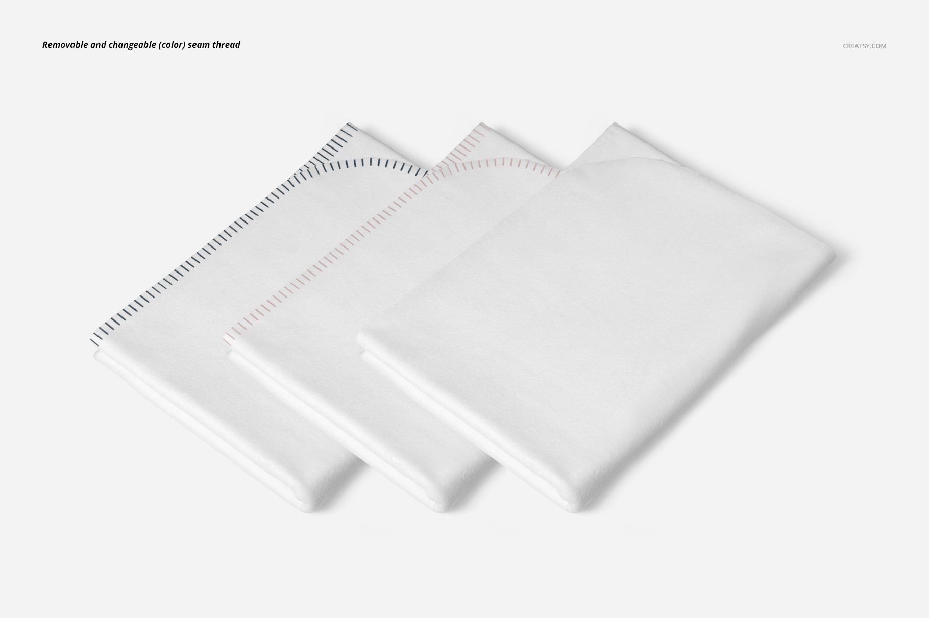PSD mockup of single layer blankets featuring black, red, and white seam details, arranged side by side on a light surface.