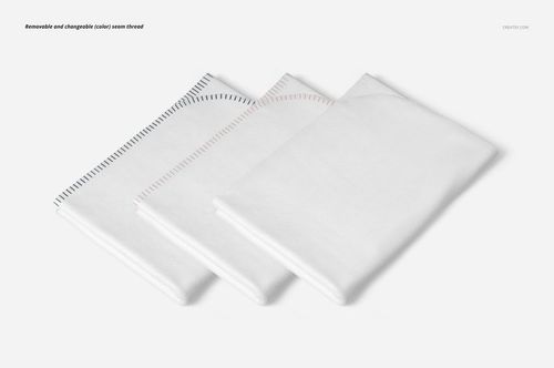 PSD mockup of single layer blankets featuring black, red, and white seam details, arranged side by side on a light surface.