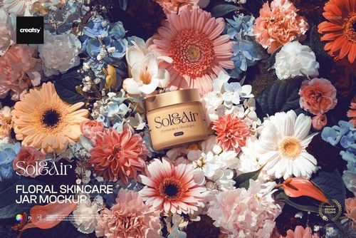 Cosmetic cream jar mockup displayed among assorted pink, peach, and white flowers in a vibrant floral arrangement.