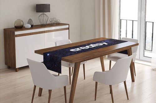 Modern dining room scene featuring a wooden table with a table runner mockup showing a starry night design.