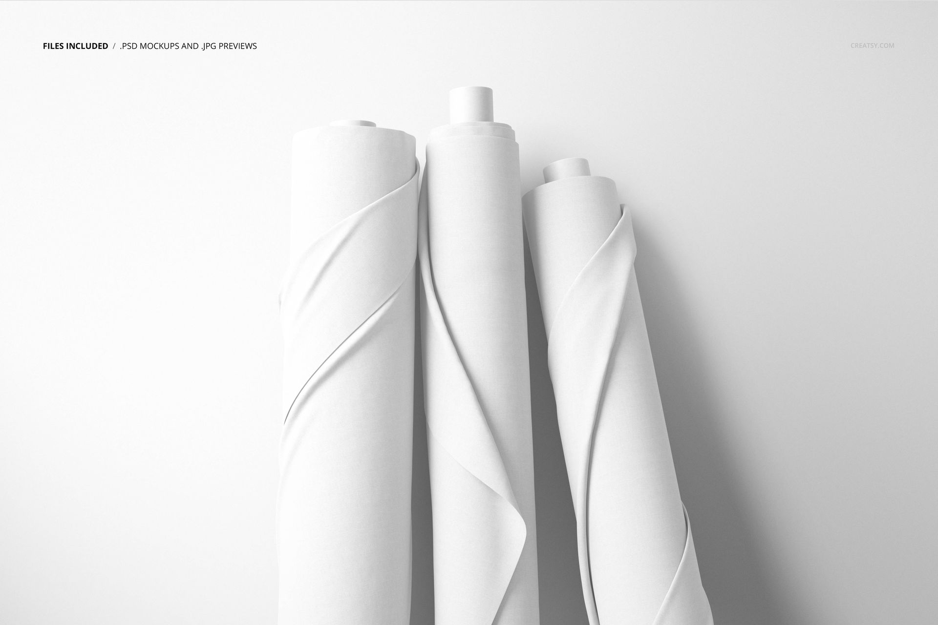 White textile rolls displayed upright in a minimalistic scene, suitable for use in a fabric PSD mockup.